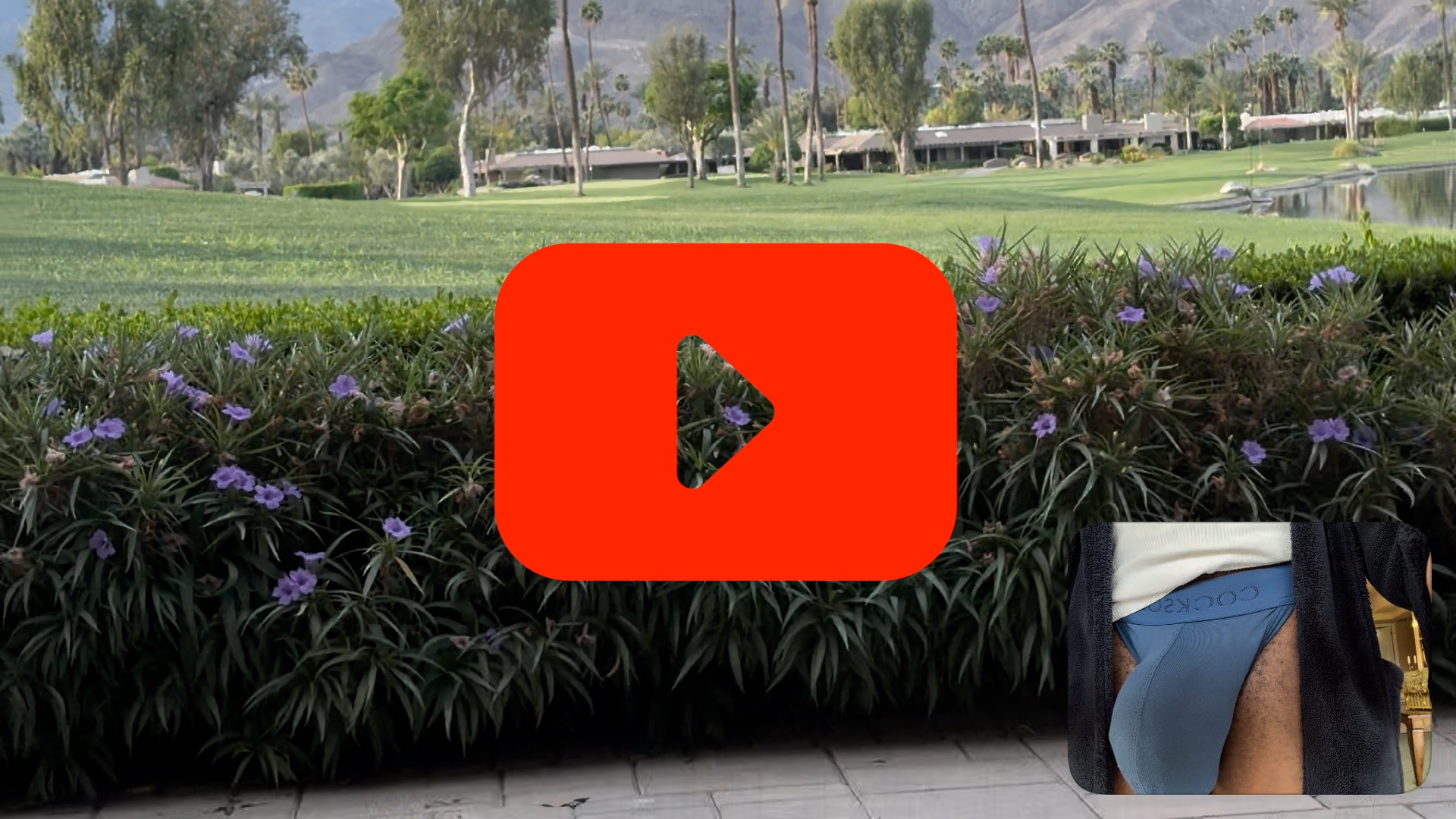 big bulge in robe with play buttom over lay